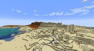 This seed may start in a desert, but it has plenty to offer (Image via Mojang)